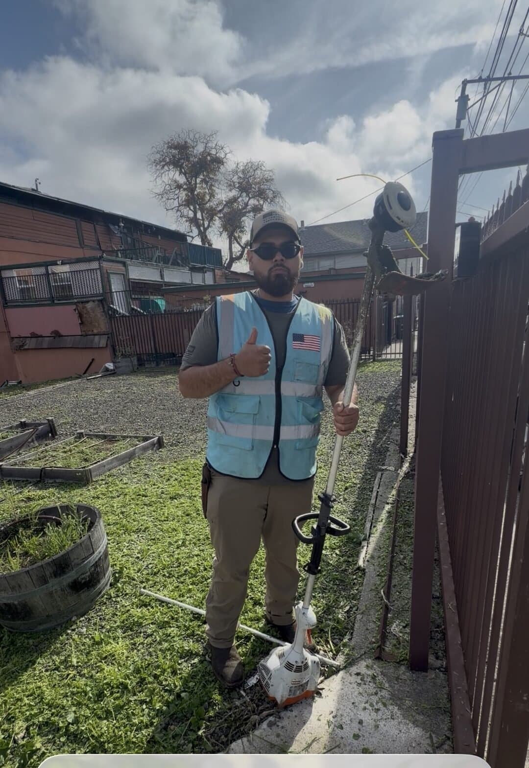 Eco-Scapes crew member after completing yard cleanup and string trimming in Vallejo CA
