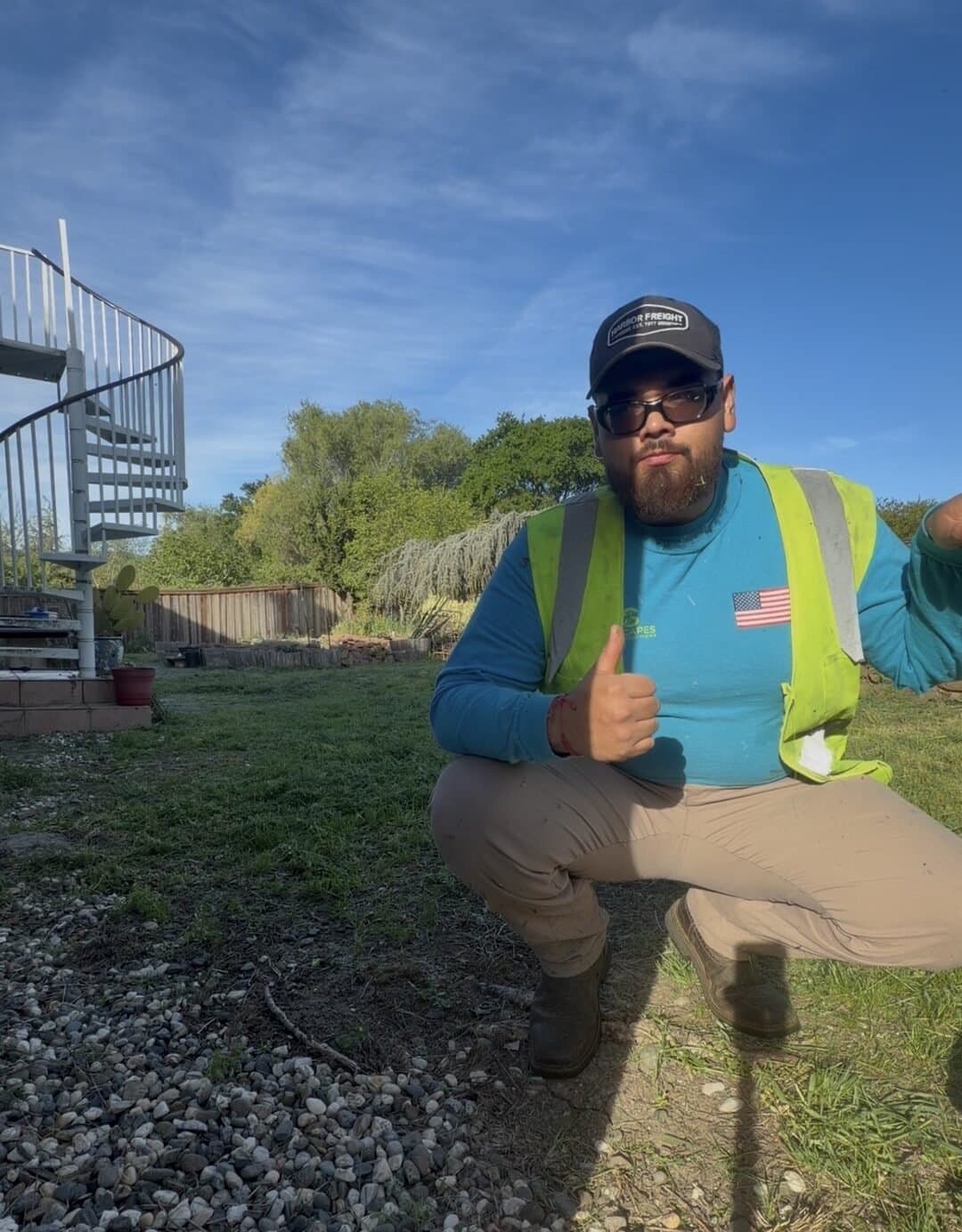 Eco-Scapes crew member after backyard lawn maintenance in Suisun City CA