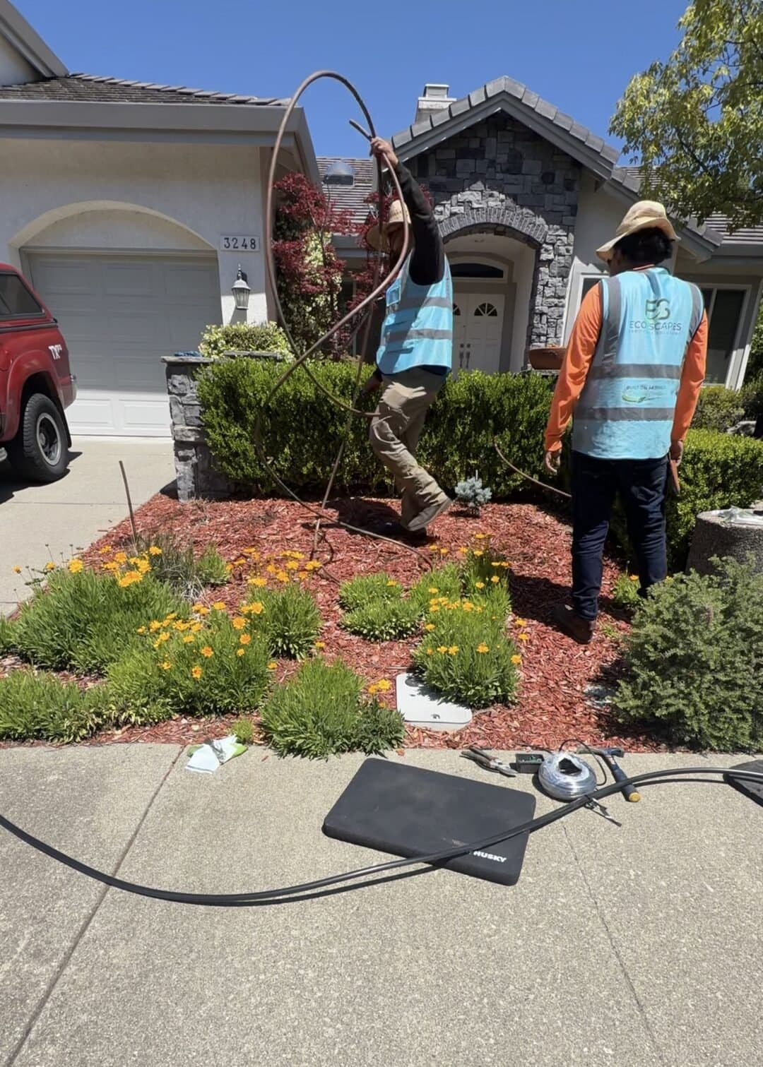 Eco-Scapes crew installing drip irrigation line in the front yard of a Fairfield CA home