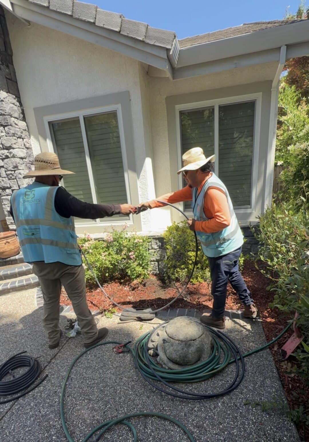 Eco-Scapes crew installing drip irrigation tubing at a Napa CA residential property